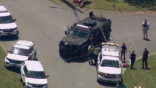 Deadly standoff turned neighborhood into warzone, residents say | WSOC-TV