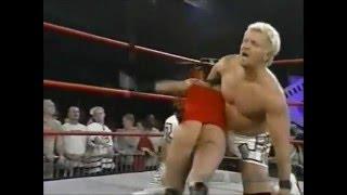 Dusty Rhodes spanks Trinity in thong