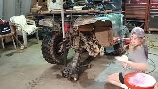 part 1. 12 yo Emma work'n on the fourwheeler