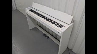 Roland F110 compact slim size Digital Piano in white  stock # 24539