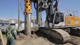 Liebherr LB 24 and LB 28 installing seacant pile wall using segmental casing