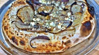 Pizza with Cheese, Truffle Oil, Roasted Potatoes, and Onions! 