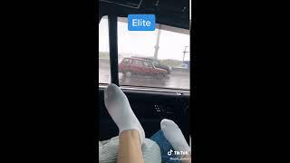 My sister bare socks feet at dad car