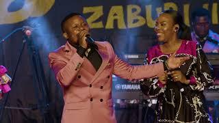 Agape Gospel Band ft Sarah Ndosi - Amenishangaza ( Official Music Video )