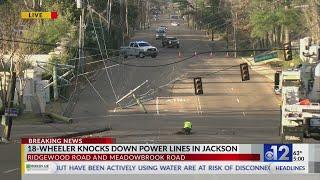 18-wheeler knocks down power lines in Jackson, causing outage