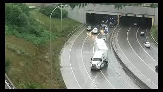 Traffic cams capture semi truck jackknife in rain-slick Minneapolis tunnel