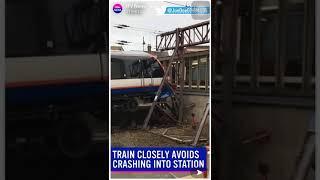 London overground train narrowly avoids CRASH into station