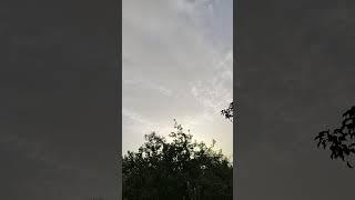 Majestic clouds sweep gracefully across the beautiful sky
