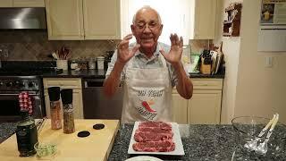 Grilling Steaks on the BBQ and Tomato Salad by Pasquale Sciarappa