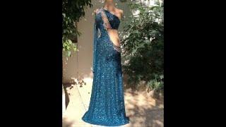 Blue dress with broosh. Belly dance costume by  Sufel Boutique. ベリーダンス衣装