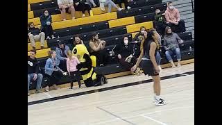 a hug from the Jacket mascot