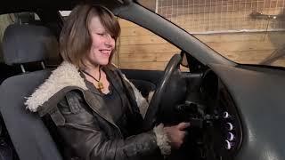 Angelica sneaks into her neighbour's garage to crank the car