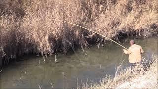fishing in a canal in Uzbekistan | an Uzbek fisherman