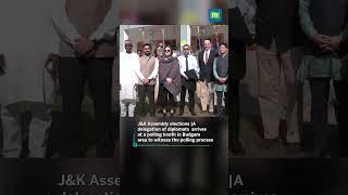 A delegation of diplomats  arrives at a polling booth in Budgam to witness the polling