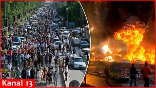 Tens of thousands flee Tehran, violent missile strikes rock Iranian oil bases