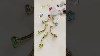 Jolie is calling your name  The Orchid Belly Ring is a modern classic