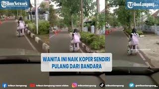 Viral Wanita Ini Naik Koper Sendiri Pulang dari Bandara @TRIBUNLAMPUNGNEWSVIDEO