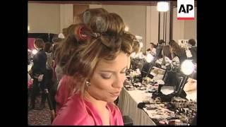 Models prepare backstage for the annual Victoria's Secret fashion show