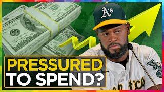 A's suddenly spending more to avoid grievance?