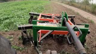 John Deere 4105 Disking Front Field with Titan Disk