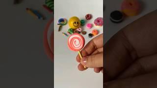  Tiny Temptations: Orange fluo Lollipop in Air-dry Clay 