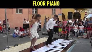 Professionnal dance on giant floor piano