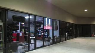 Visible Vitrum Storefront Projection Screen at Texas Hair Team