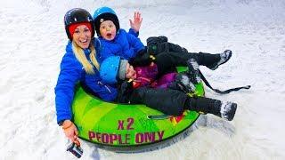 Gaby, Alex and Mom play in the snow at the Winter Play Center