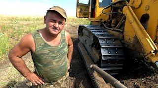 Василий мастер в своем деле, но техника не выдерживает его нагрузок! Отвал трещит по швам!