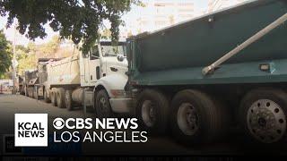 Truck drivers who helped clear debris from Palisades Fire say they still haven't been paid