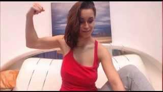 n38 fit camgirl flexes biceps muscles