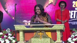Rev Joan of JCM Nakuru encouraging words to Bishop Ben Kiengei and RevJoyBen Kiengei
