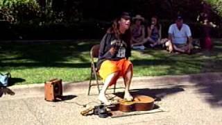 Mark Goffeney plays guitar with his feet