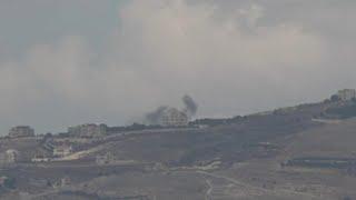 Smoke plumes rise from southern Lebanon as Israeli military aircraft fly above the border