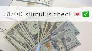 allocating my stimulus check package + cash envelope stuffing  | debt | savings | investing