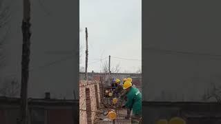The process of straightening a crooked brick wall