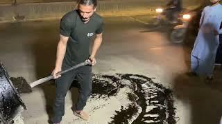 New Year Night - Fixit Team Alamgir Khan repairing dangerous Pothole at Karimabad Flyover, Karachi