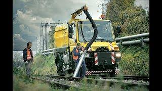 №1. Локомобиль Unimog U400. Навеска: пылесос вакуумный и КМУ.