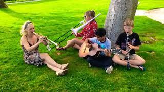 Amazing kids play trad jazz - just a little while to stay Here