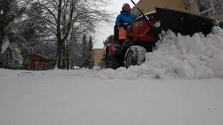 Mini tractor snow removal