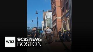Man grabbed officer's gun near MGH and shot himself in foot, police say