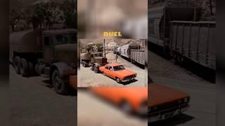 Semi Truck tries to push a car into a moving train  Duel