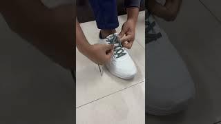 Tying shoe laces of my new power white sports sneakers or shoes #shorts #sneakers #whiteshoes