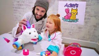 PET CLINIC ROUTINE! Doctor Adley and Dad take care of moms new unicorn with Rainglow Unicorn Vet Set