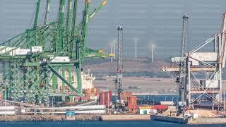 Aerial view of container cargo terminal of commercial port timelapse, business logistics and