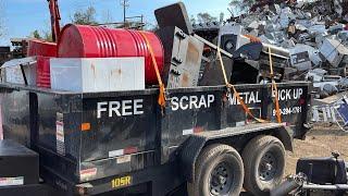 Loading my scrap metal trailer from my scrap yard.