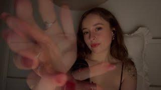 ASMR mesmerizing hand movements with trigger words and echoed mouth sounds