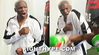 FLOYD MAYWEATHER SR. DEMONSTRATES SHOULDER ROLL EFFECTIVENESS; DEFLECTS "HARD AS YOU CAN" PUNCHES