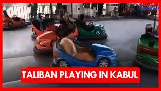 Taliban with Guns playing merry go round, Dodgem cars, Jumping trampoline, Gym in parks of Kabul