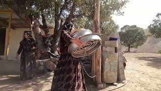 "Zahra's Trip to Her Brother's House: Borrowing Supplies for Baking Traditional Bread"